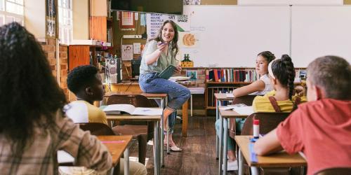 A teacher talking to her class