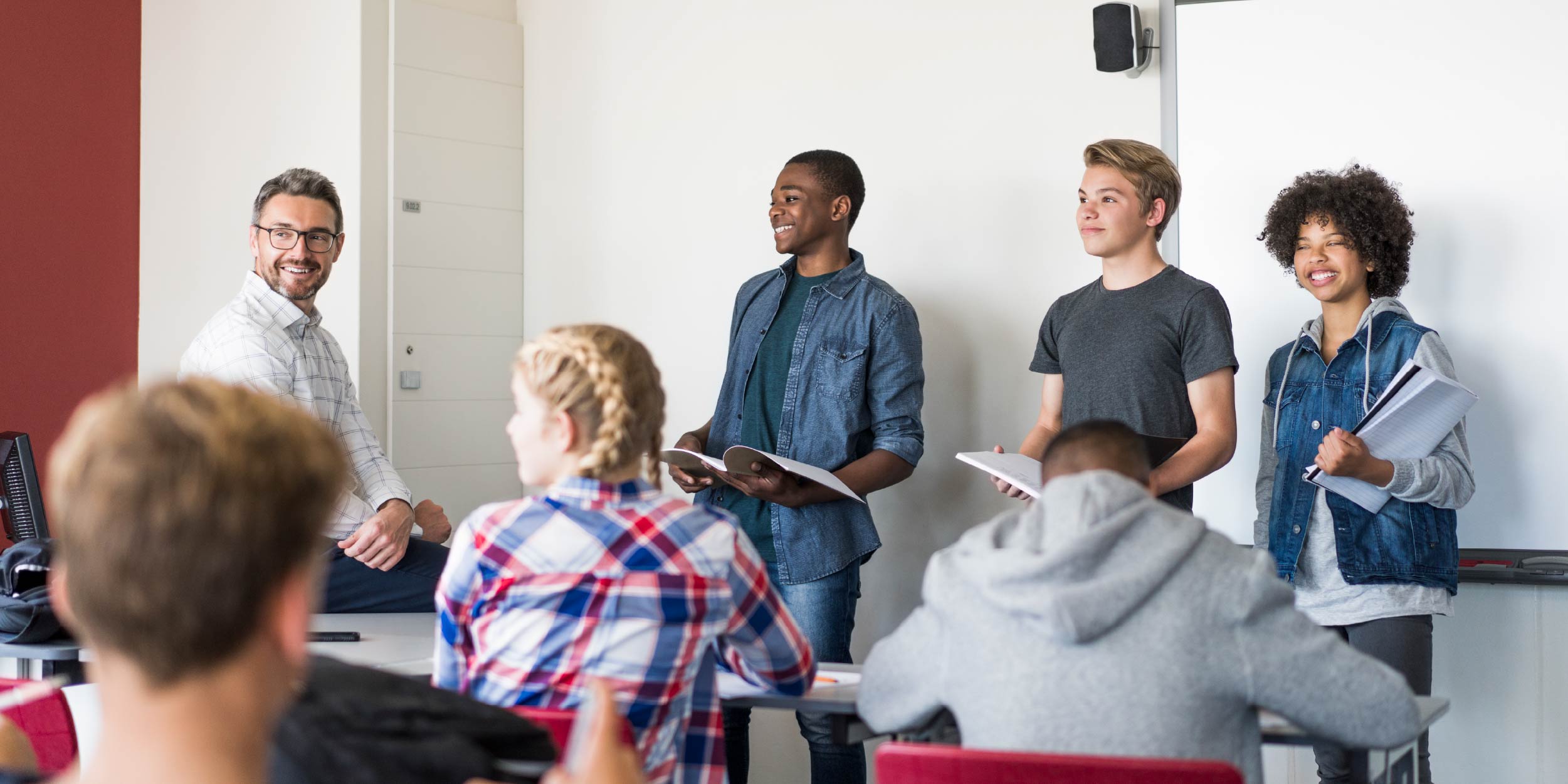 A group of students presenting to their class